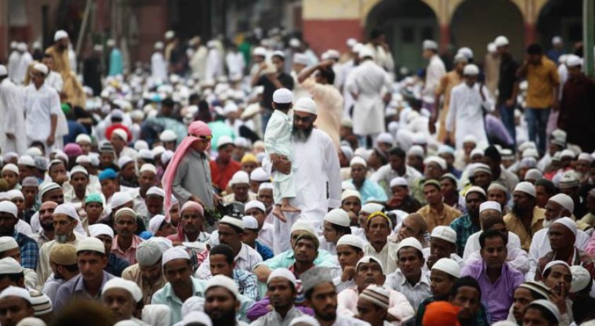 Muslims offer namaz on Eid at the Fatehpuri mosque in Chandni Chowk, Old Delhi on saturday. Express Photo by Tashi Tobgyal New Delhi 180715