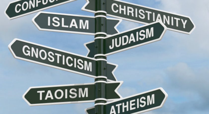 Directional signs pointing to various religions