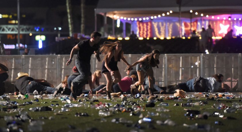 LAS VEGAS, NV - OCTOBER 01  People run from the Route 91 Harvest country music festival after apparent gun fire was heard on October 1, 2017 in Las Vegas, Nevada. There are reports of an active shooter around the Mandalay Bay Resort and Casino.  (Photo by David Becker/Getty Images)